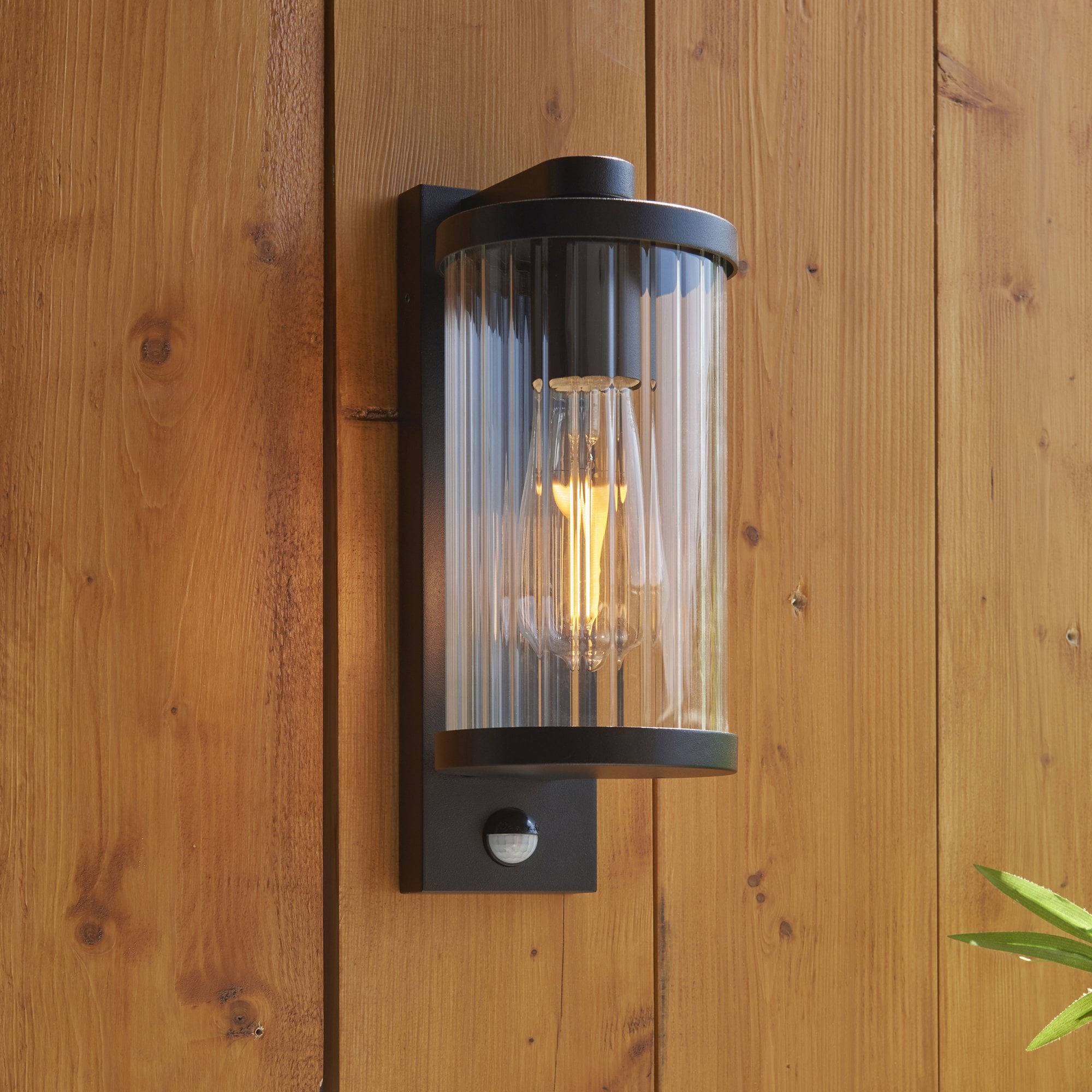 120537 Newcombe Outdoor Pir Wall Light Matt Black & Clear Ribbed Glass