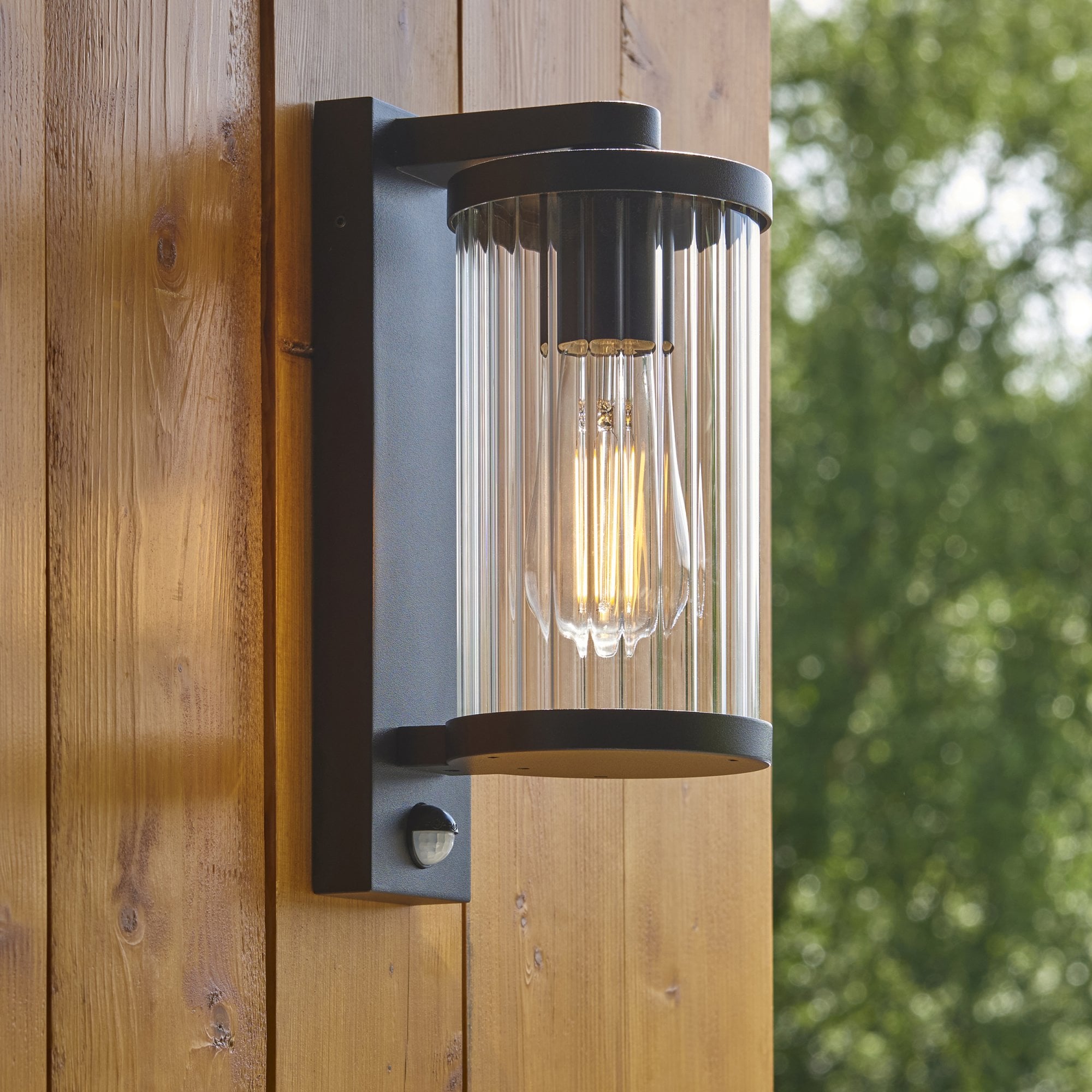 120537 Newcombe Outdoor Pir Wall Light Matt Black & Clear Ribbed Glass