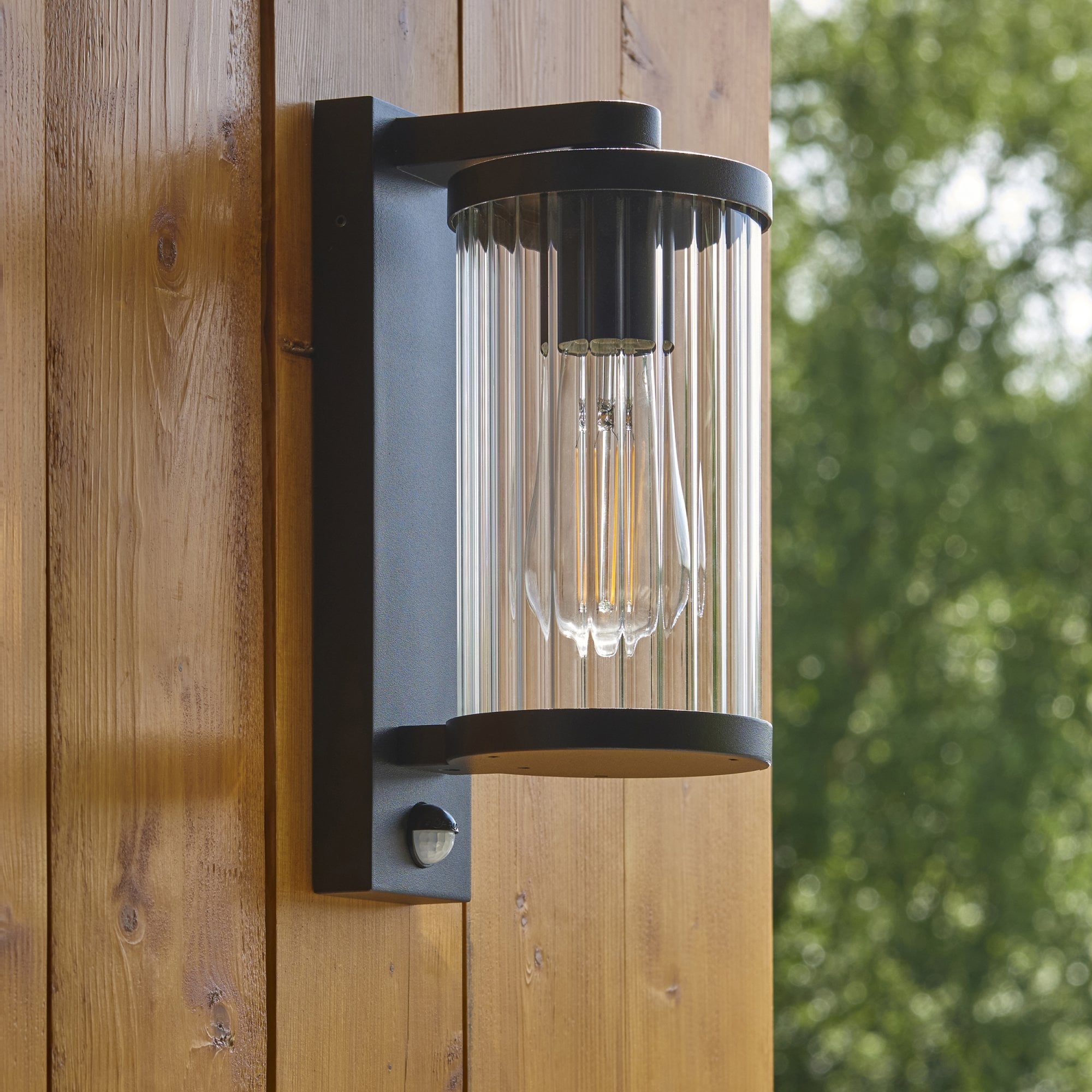 120537 Newcombe Outdoor Pir Wall Light Matt Black & Clear Ribbed Glass
