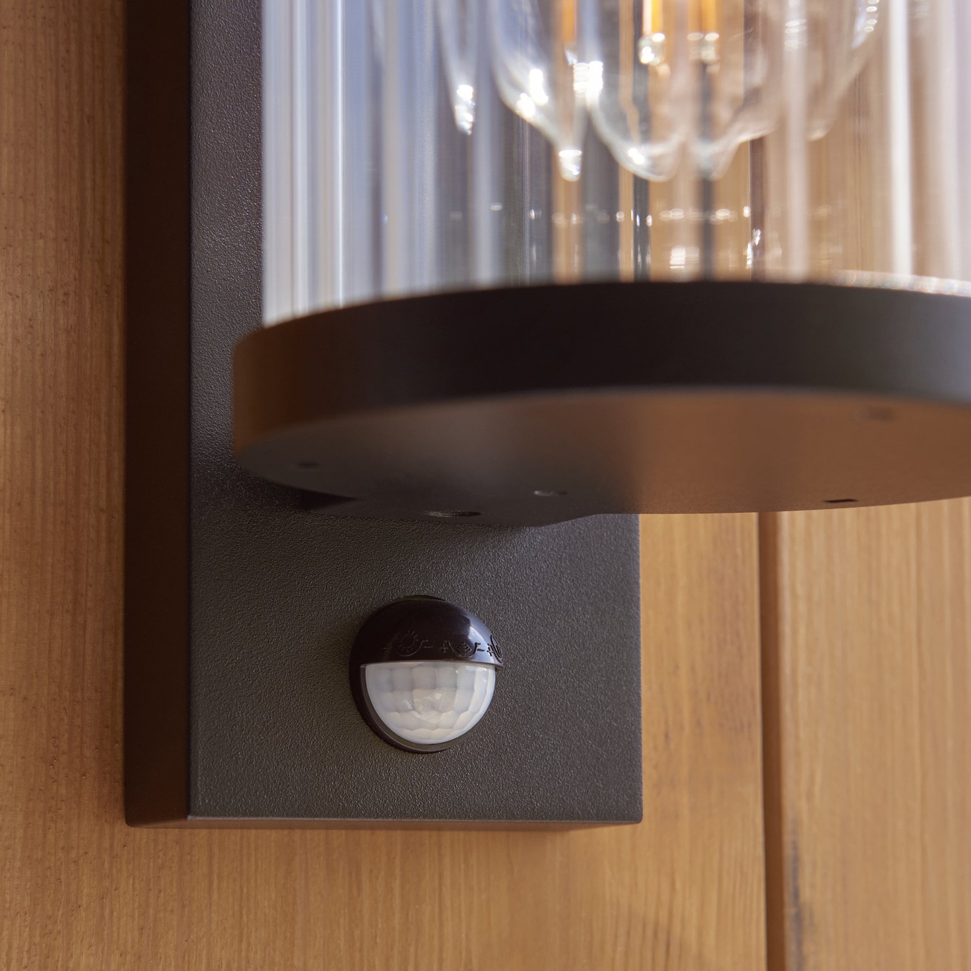 120537 Newcombe Outdoor Pir Wall Light Matt Black & Clear Ribbed Glass