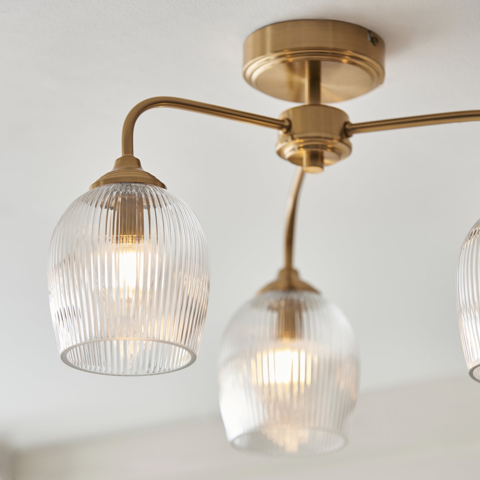 120617 Ashcroft Ribbed 3 Light Semi Flush Ceiling Light Brushed Aged Brass Plate & Clear Ribbed Glass