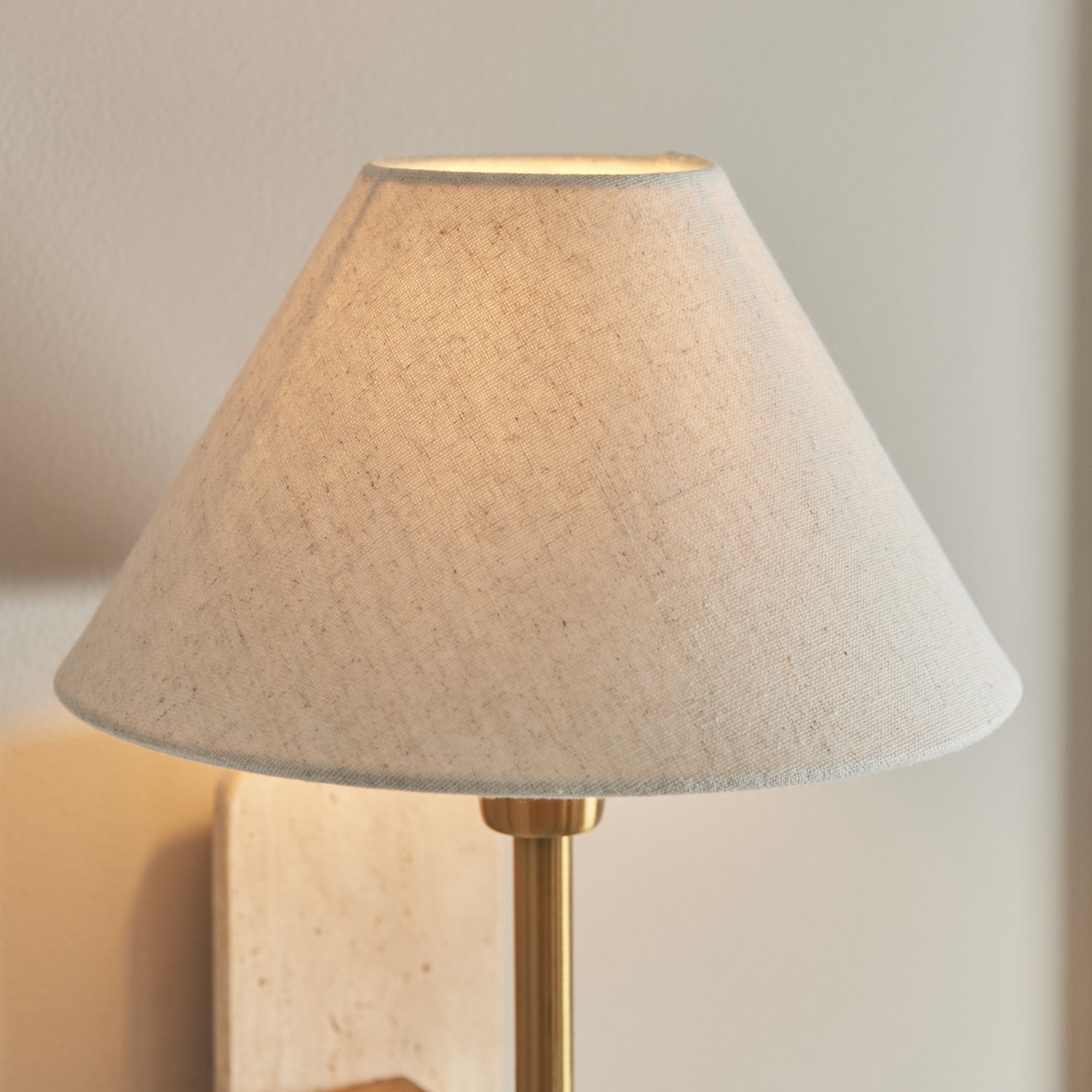 120637 Faro Wall Light Natural Travertine & Vintage Brass With Natural Linen