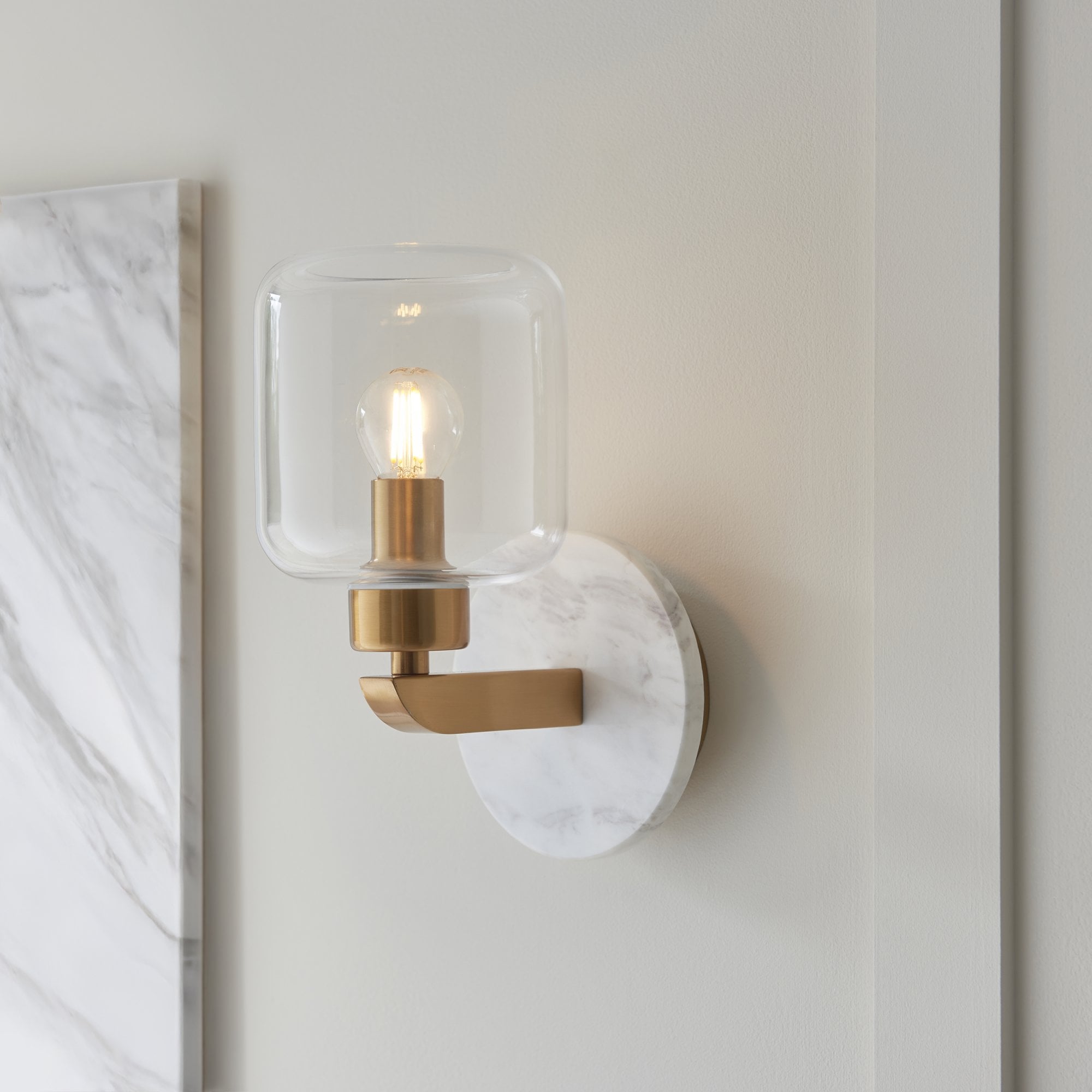 120660 Travi Wall Light White Volakas Marble, Vintage Brass & Clear Glass