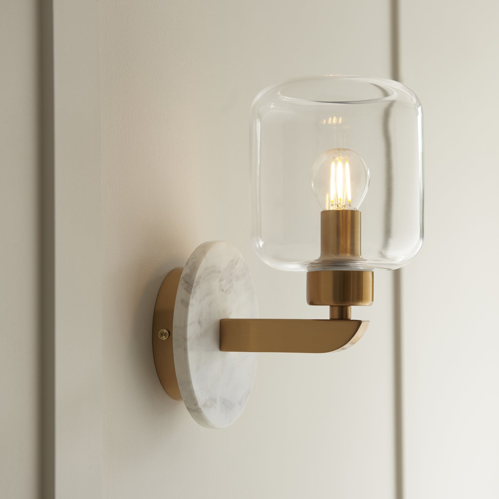 120660 Travi Wall Light White Volakas Marble, Vintage Brass & Clear Glass