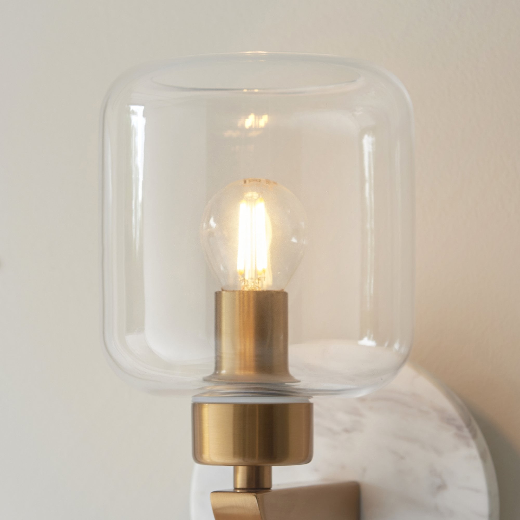 120660 Travi Wall Light White Volakas Marble, Vintage Brass & Clear Glass
