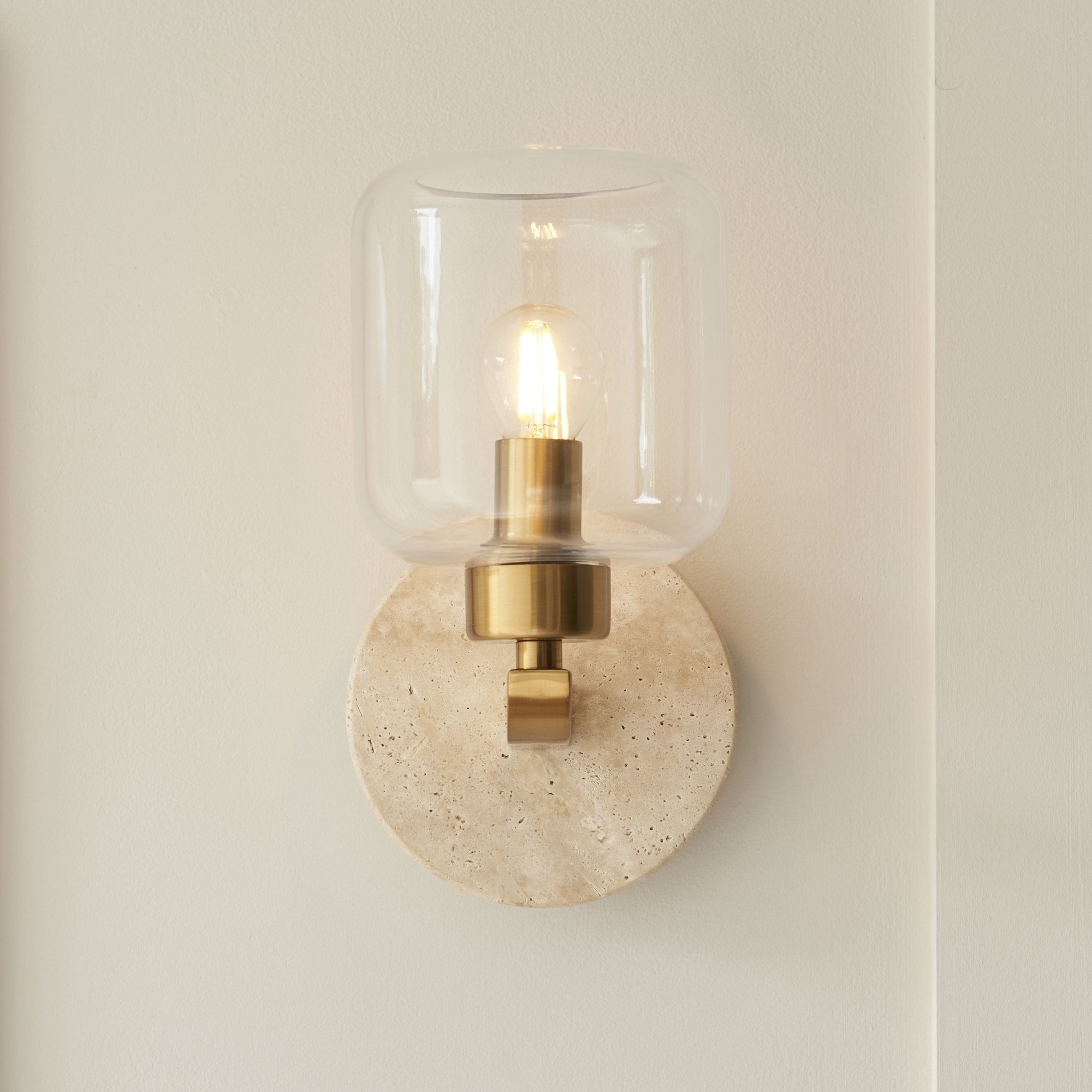 120662 Travi Wall Light Natural Travertine, Vintage Brass & Clear Glass
