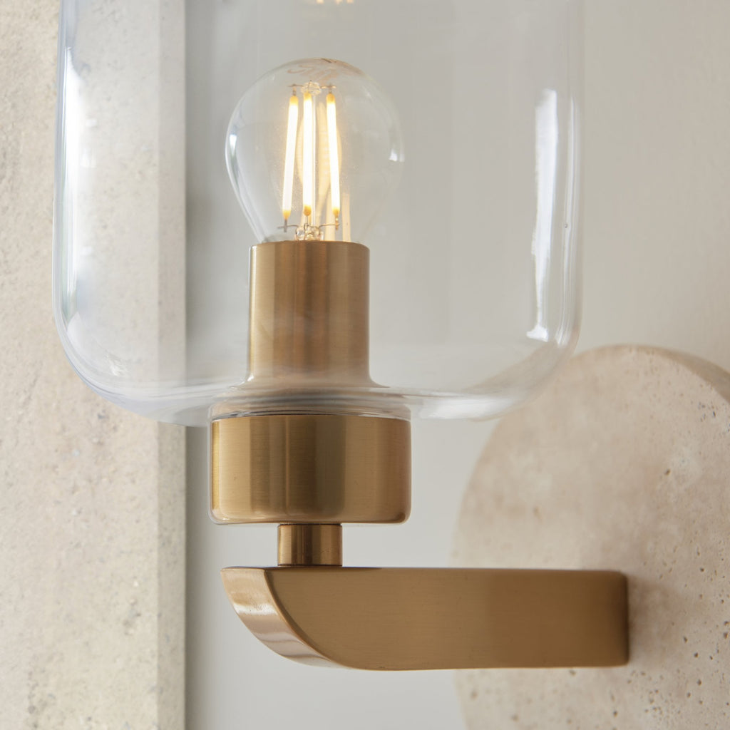 120662 Travi Wall Light Natural Travertine, Vintage Brass & Clear Glass