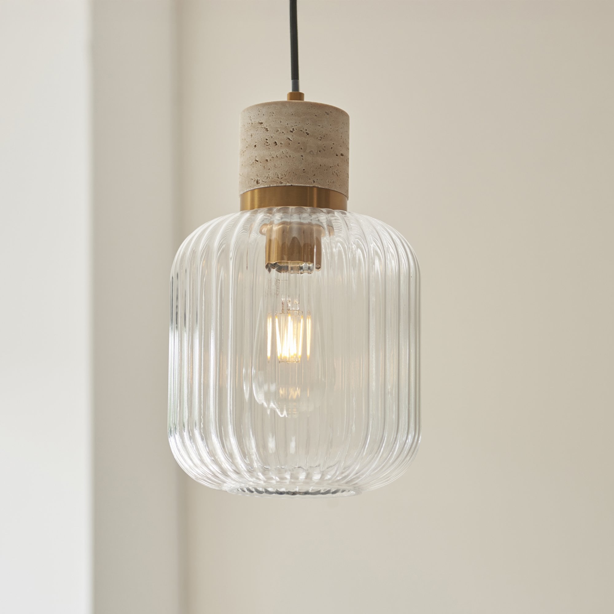 120664 Travi Ribbed Pendant Natural Travertine, Vintage Brass & Clear Ribbed Glass