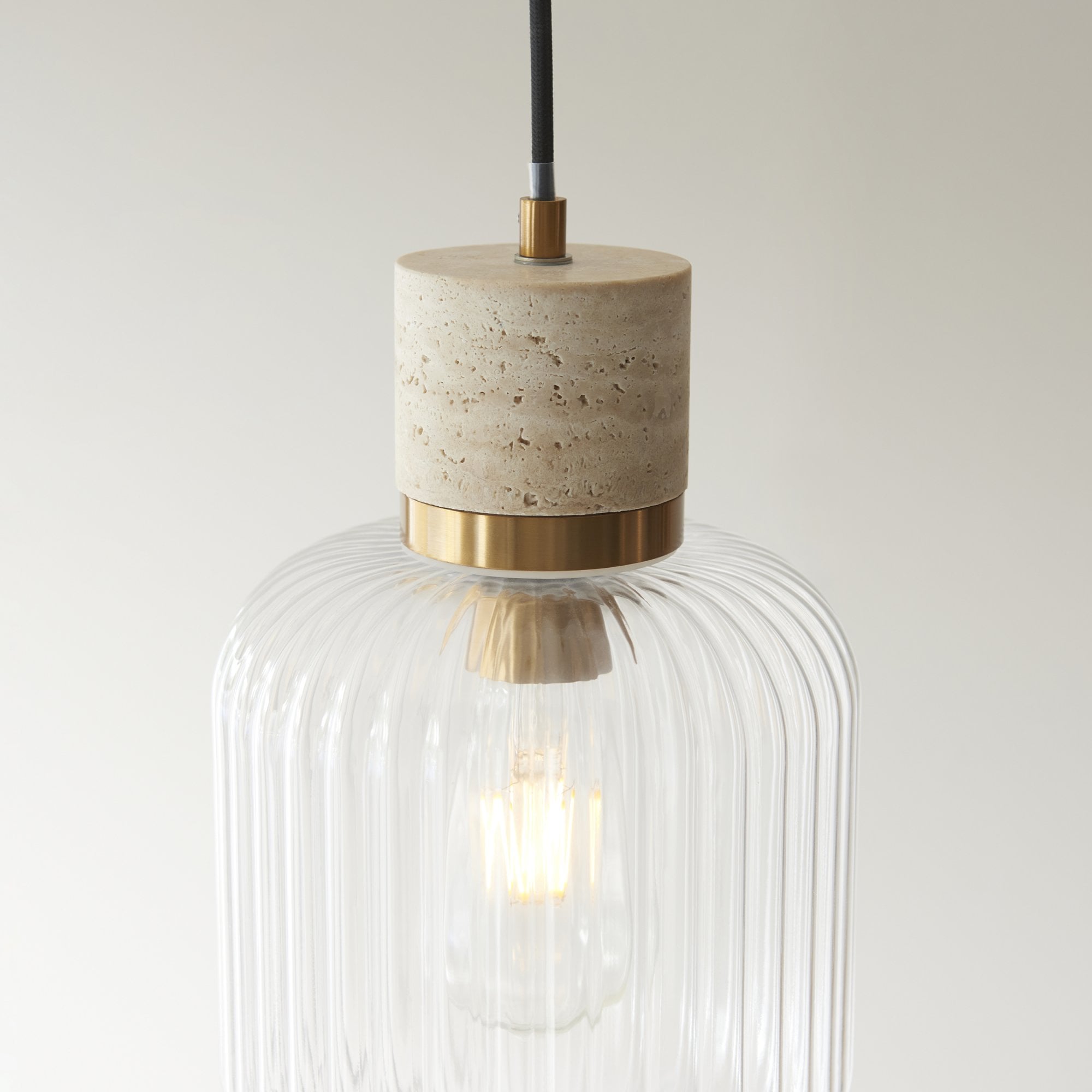 120664 Travi Ribbed Pendant Natural Travertine, Vintage Brass & Clear Ribbed Glass
