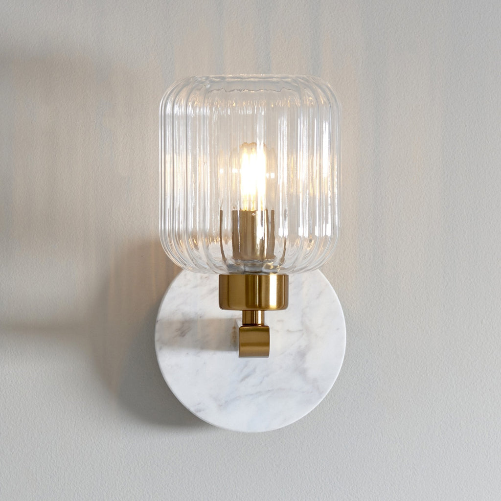 120666 Travi Ribbed Wall Light White Volakas Marble, Vintage Brass & Clear Ribbed Glass