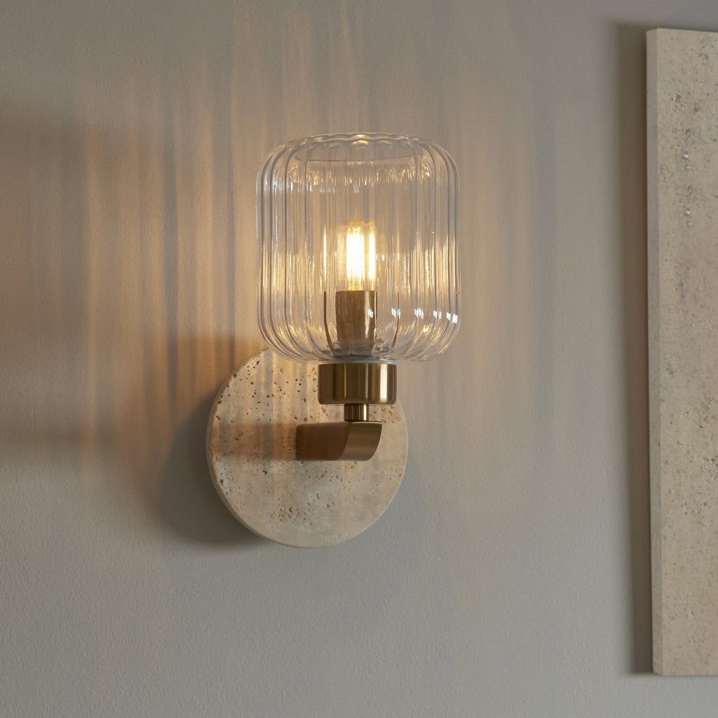120668 Travi Ribbed Wall Light Beige Textured Marble, Vintage Brass & Clear Ribbed Glass