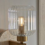 120668 Travi Ribbed Wall Light Beige Textured Marble, Vintage Brass & Clear Ribbed Glass