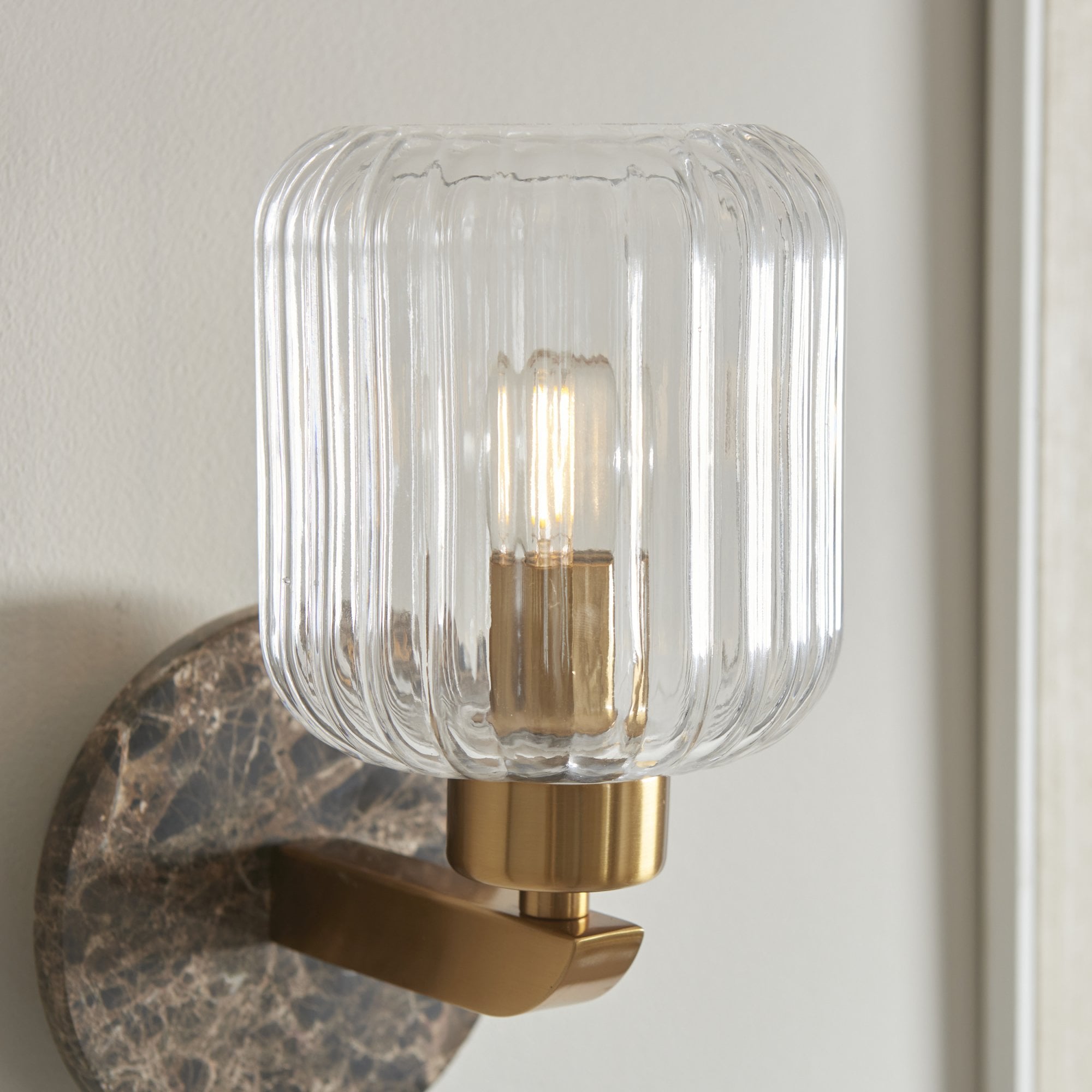 120669 Travi Ribbed Wall Light Dark Brown Emperador Marble, Vintage Brass & Clear Ribbed Glass