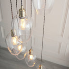 120646 7 Light Pendant Antique Brass Plate & Clear Glass