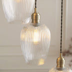 120654 7 Light Pendant Antique Brass Plate & Clear Ribbed Glass