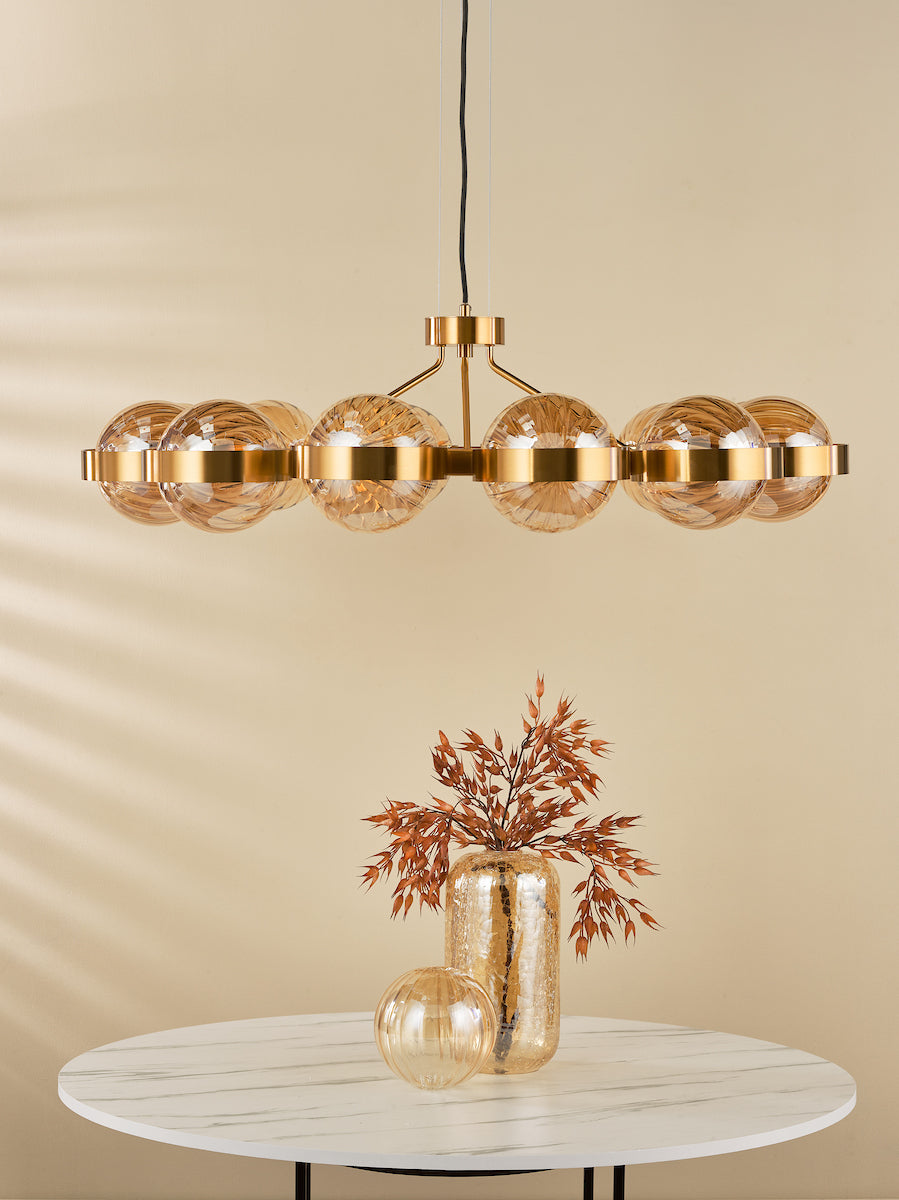 OPH1235 Ophira 12 Light Pendant Antique Gold and Amber Ribbed Glass