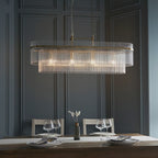 112573 Endon Marietta 4 Light Linear Pendant — Antique Brass & Clear Glass