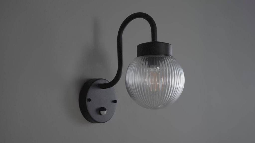 103829 Eldon Outdoor 1 Light Wall Textured Black And Clear Ribbed Glass