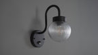 103829 Eldon Outdoor 1 Light Wall Textured Black And Clear Ribbed Glass